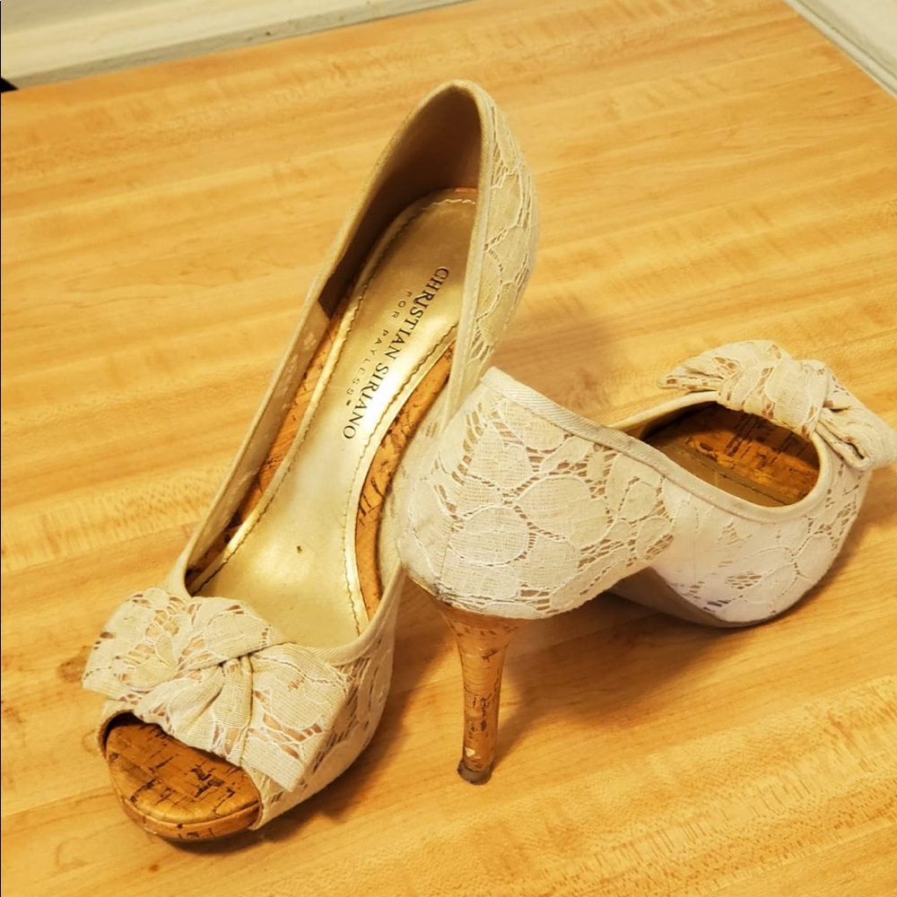 Christian Seriano lace pumps with a bow